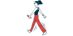 A woman in exercise clothes walks holding a water bottle.