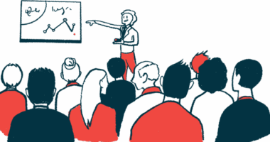 A person presents a slide to an audience.