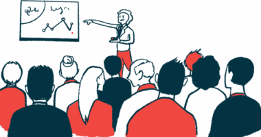 A person presents a slide to an audience.