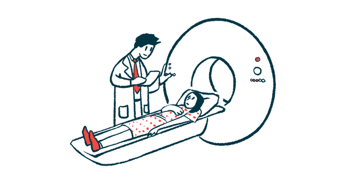 A person prepares to enter a MRI, while a clinician stands next to them.