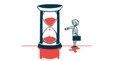 A person carrying a briefcase and standing next to a giant hourglass is seen checking his watch.