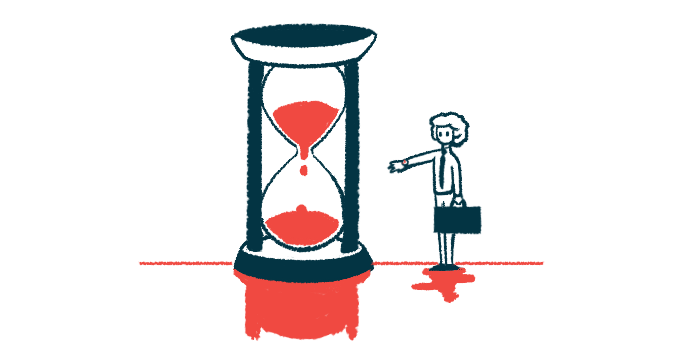 A person carrying a briefcase and standing next to a giant hourglass is seen checking his watch.